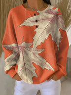 Laura | Pull en maille texturée avec motif de feuilles d'automne