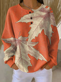 Laura | Pull en maille texturée avec motif de feuilles d'automne
