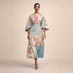 Clementine | Robe midi à motifs floraux, taille sculptée et élégance aérienne