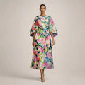 Clementine | Robe midi à motifs floraux, taille sculptée et élégance aérienne