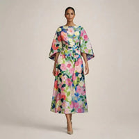 Clementine | Robe midi à motifs floraux, taille sculptée et élégance aérienne