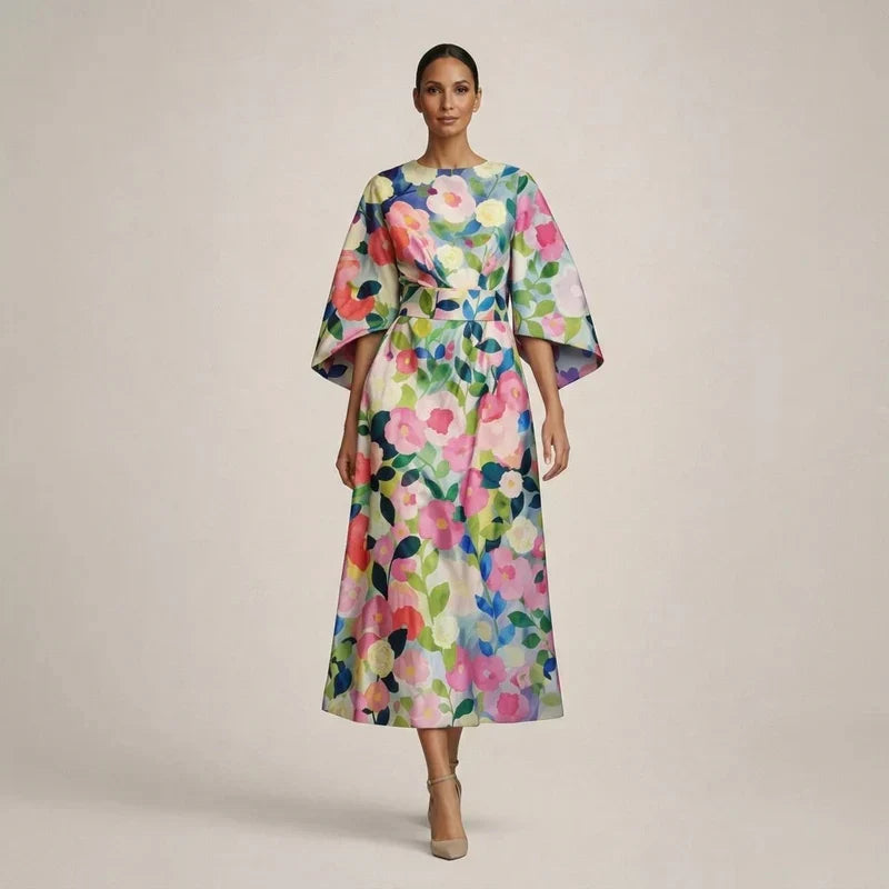 Clementine | Robe midi à motifs floraux, taille sculptée et élégance aérienne