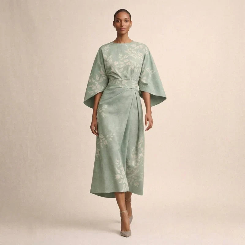 Clementine | Robe midi à motifs floraux, taille sculptée et élégance aérienne
