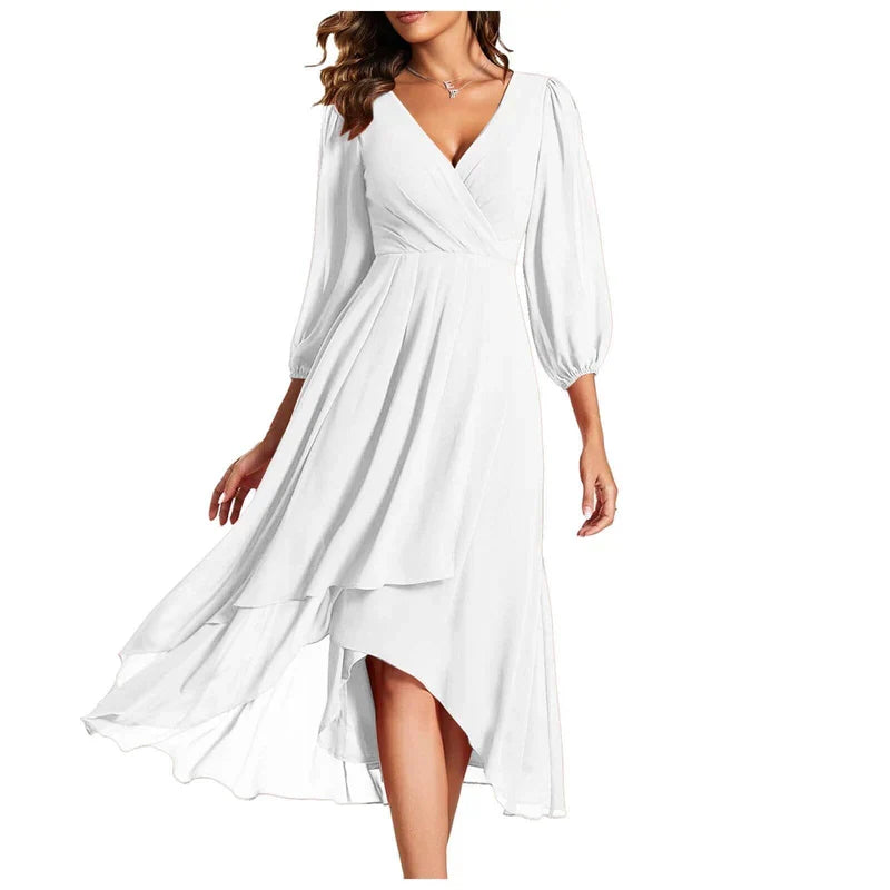Venlora Mode | Une robe élégante à ourlet asymétrique et manches fluides, pour un look raffiné