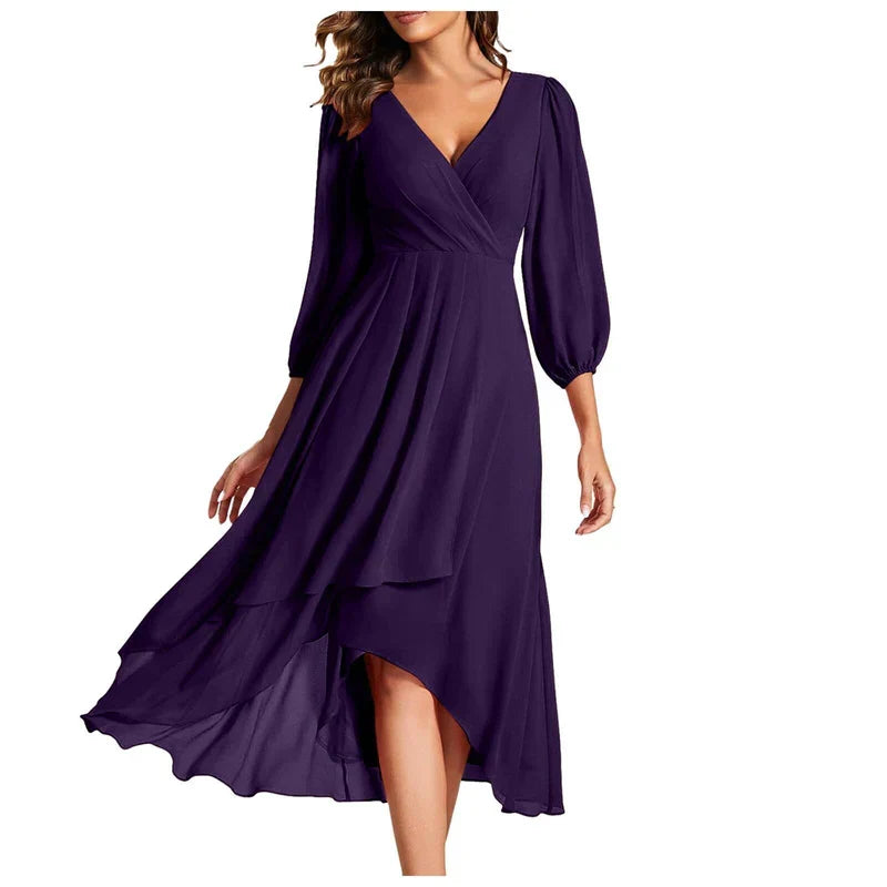 Venlora Mode | Une robe élégante à ourlet asymétrique et manches fluides, pour un look raffiné