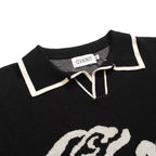 Pull vintage en jacquard rose et noir à col V pour homme