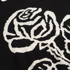 Pull vintage en jacquard rose et noir à col V pour homme