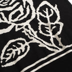 Pull vintage en jacquard rose et noir à col V pour homme