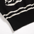 Pull vintage en jacquard rose et noir à col V pour homme