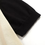 Pull en tricot noir pour homme avec col en V et empiècements jacquard