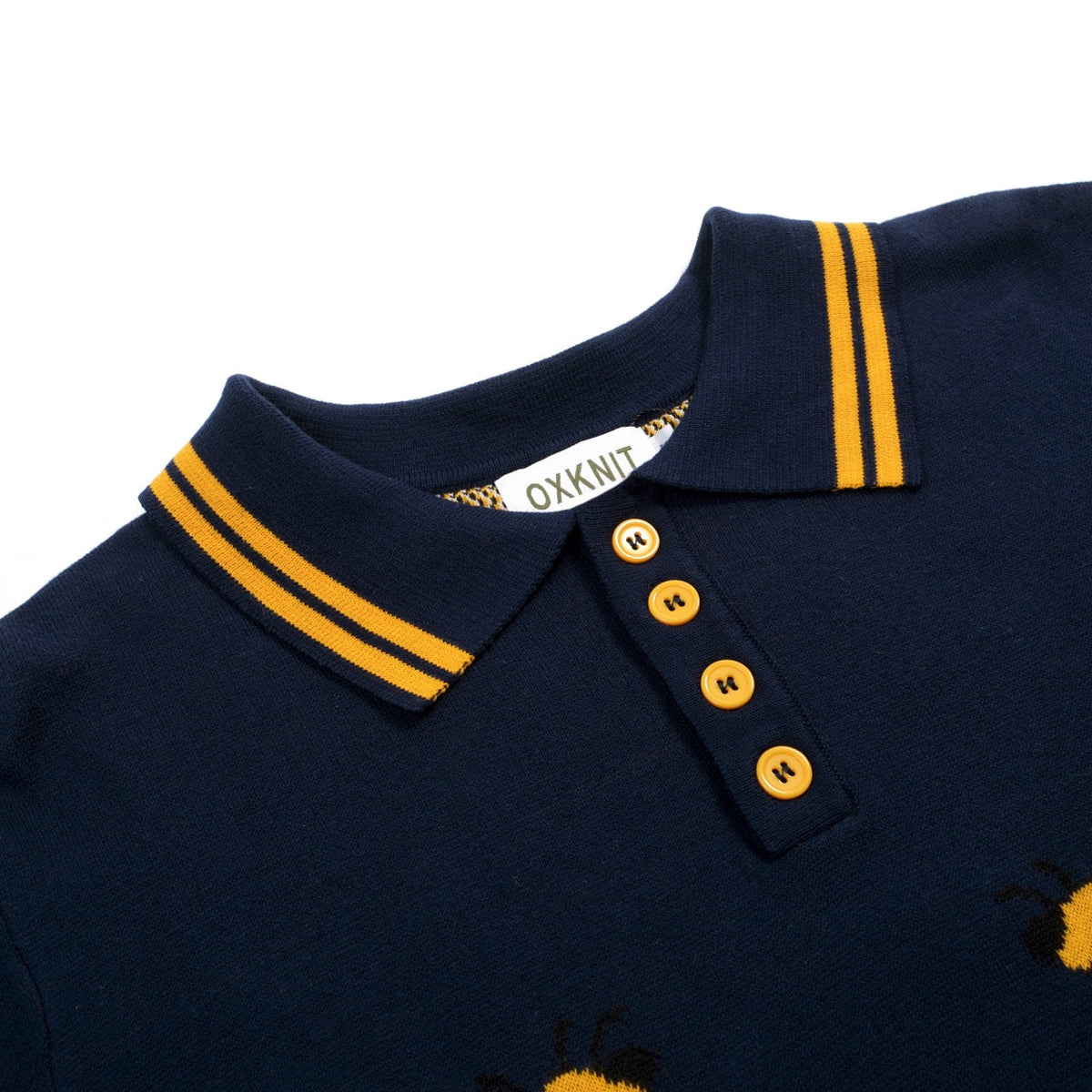 Pull vintage à manches courtes en tricot bleu marine avec motif abeille