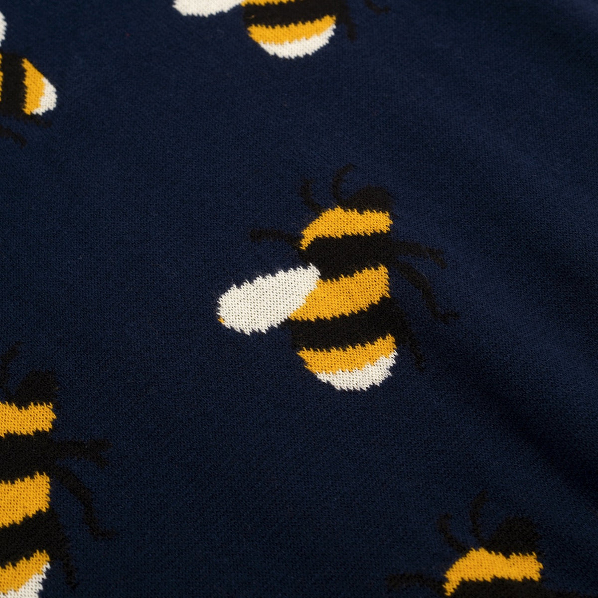 Pull vintage à manches courtes en tricot bleu marine avec motif abeille