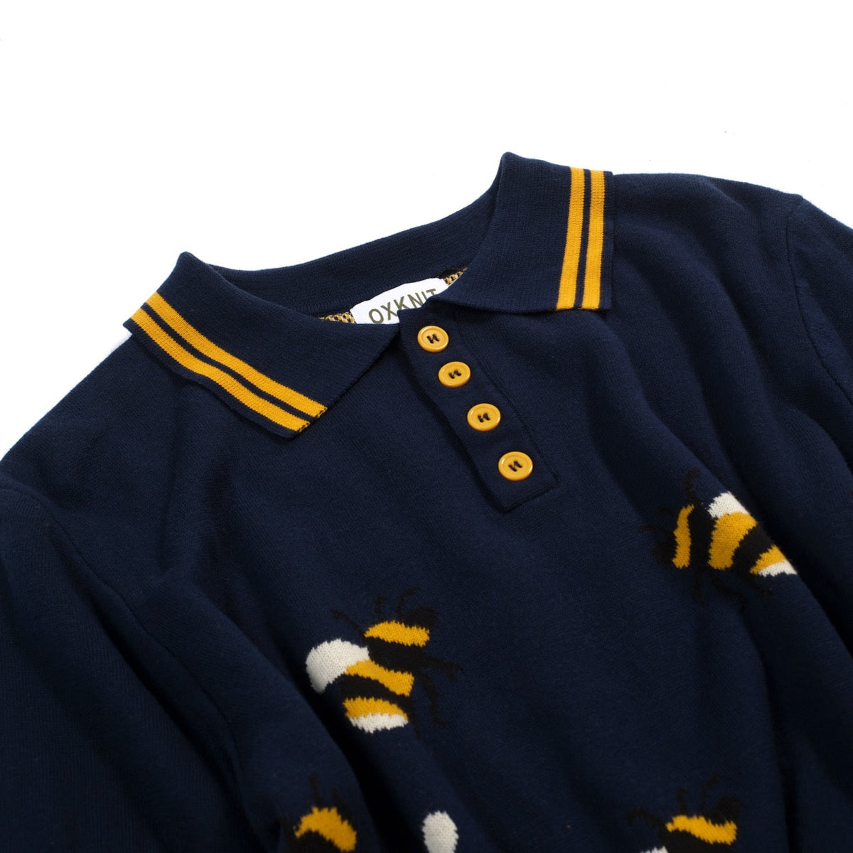 Pull vintage à manches courtes en tricot bleu marine avec motif abeille