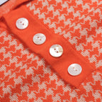Pull en maille jacquard orange à motif pied-de-poule classique pour homme
