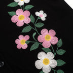 Cardigan noir pour homme en maille avec broderie florale et bords rayés