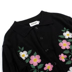 Cardigan noir pour homme en maille avec broderie florale et bords rayés