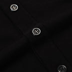 Cardigan noir pour homme en maille avec broderie florale et bords rayés