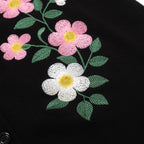 Cardigan noir pour homme en maille avec broderie florale et bords rayés