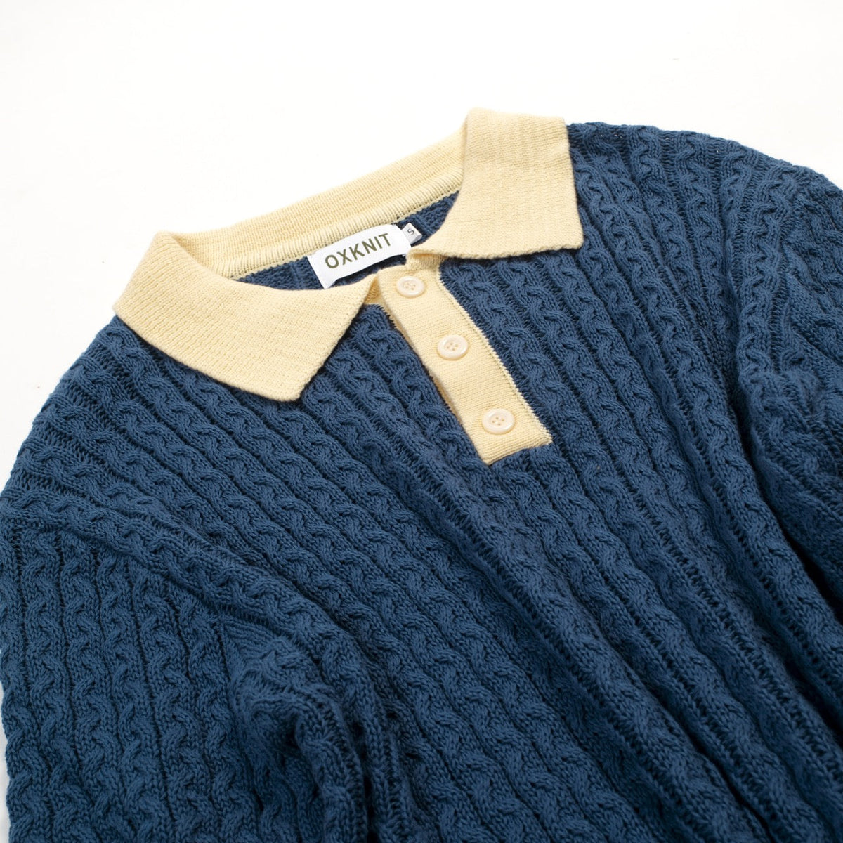 Pull bleu rétro en maille torsadée pour homme
