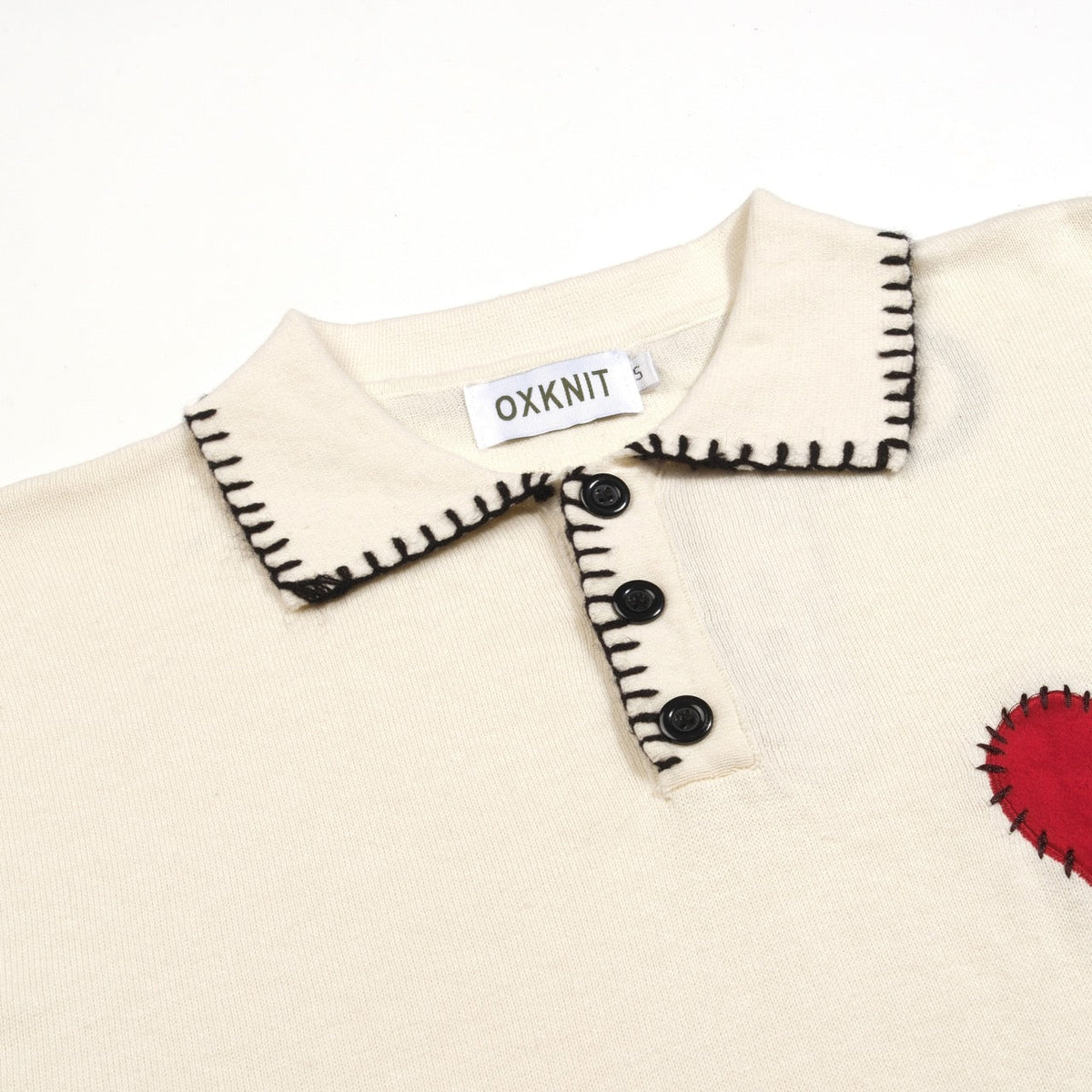 Pull rétro abricot pour homme avec cœur brodé et franges