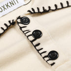 Pull rétro abricot pour homme avec cœur brodé et franges