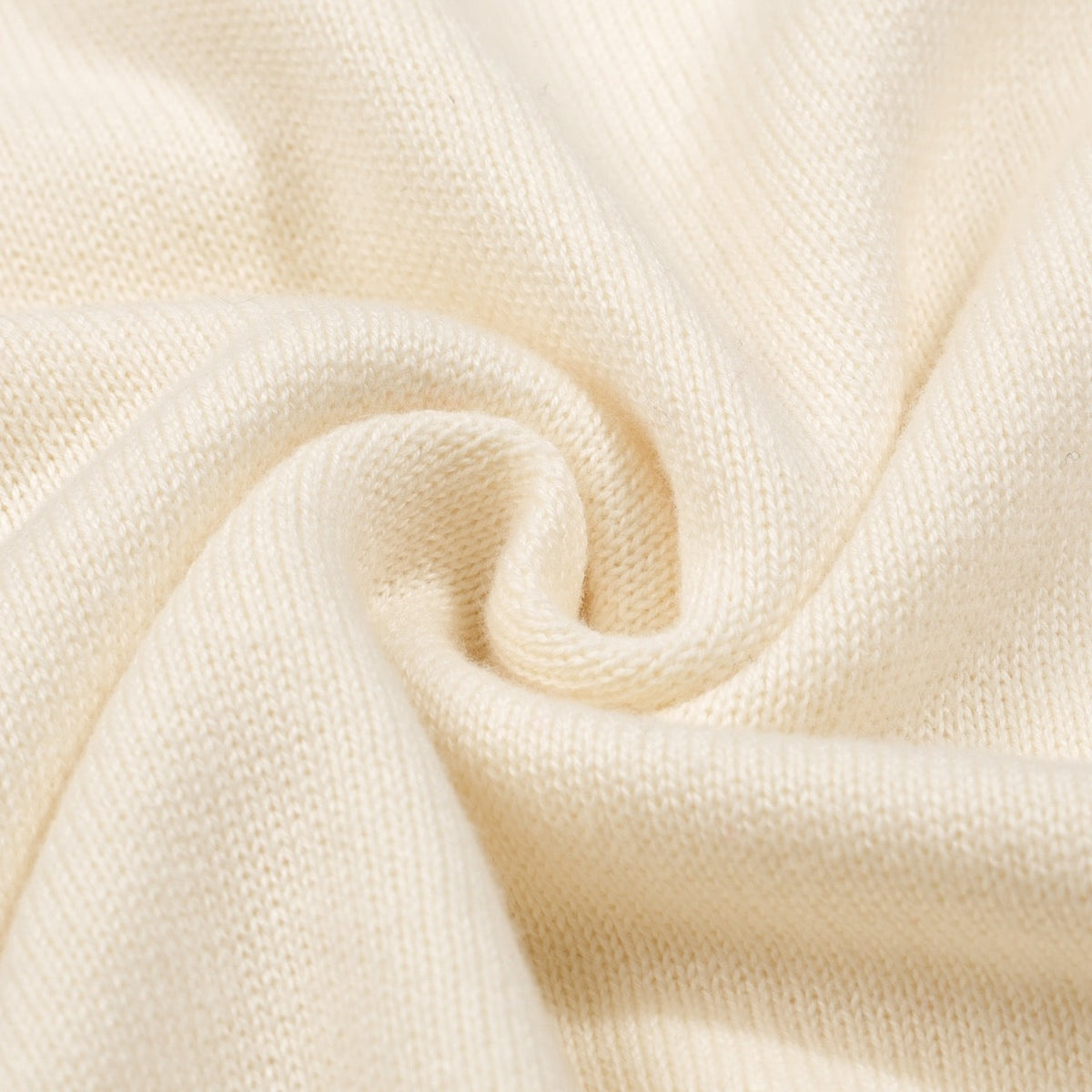 Pull rétro abricot pour homme avec cœur brodé et franges