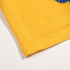 T-shirt tricoté jaune rétro des années 70 pour homme avec motif de tigre ludique