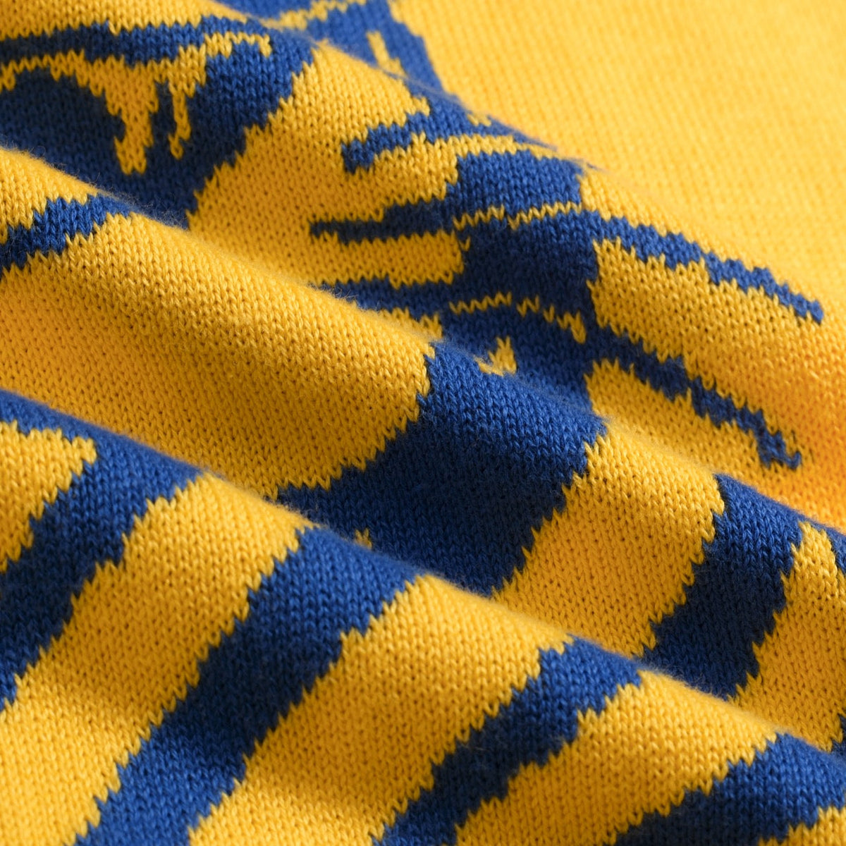 T-shirt tricoté jaune rétro des années 70 pour homme avec motif de tigre ludique