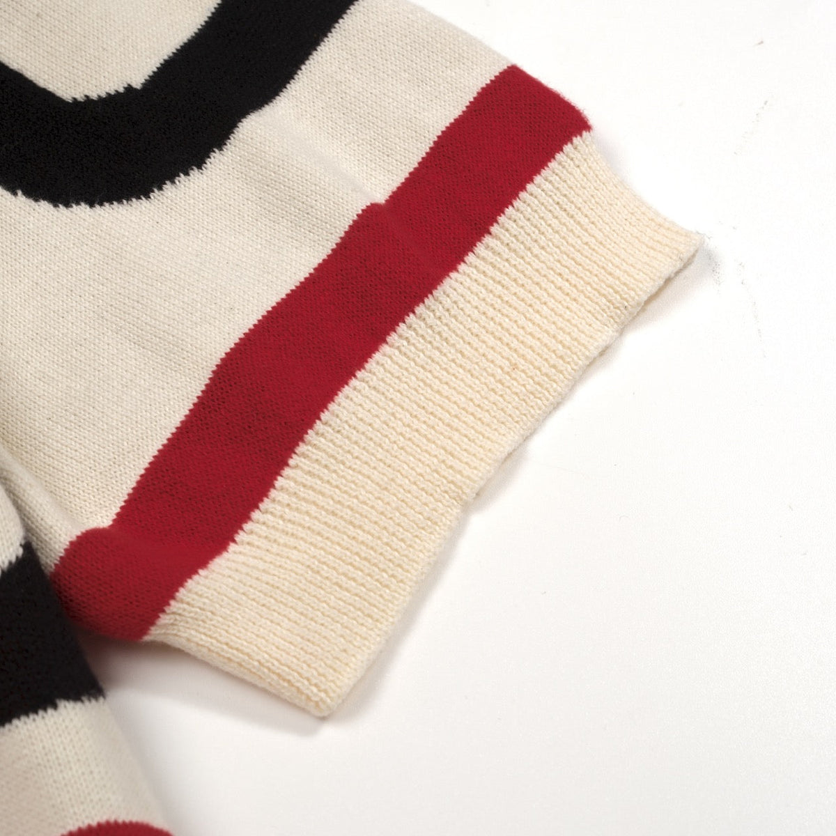 Pull en maille jacquard abstrait abricot pour homme