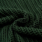 Pull en maille ajourée verte style années 70 pour homme avec col montant