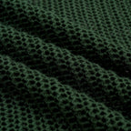 Pull en maille ajourée verte style années 70 pour homme avec col montant