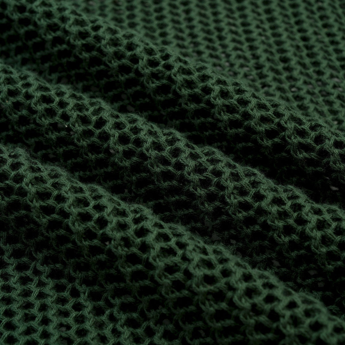 Pull en maille ajourée verte style années 70 pour homme avec col montant