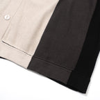 Chemise à boutons en maille noire et grise pour homme – Style années 60 avec détail en diamant sur la poitrine