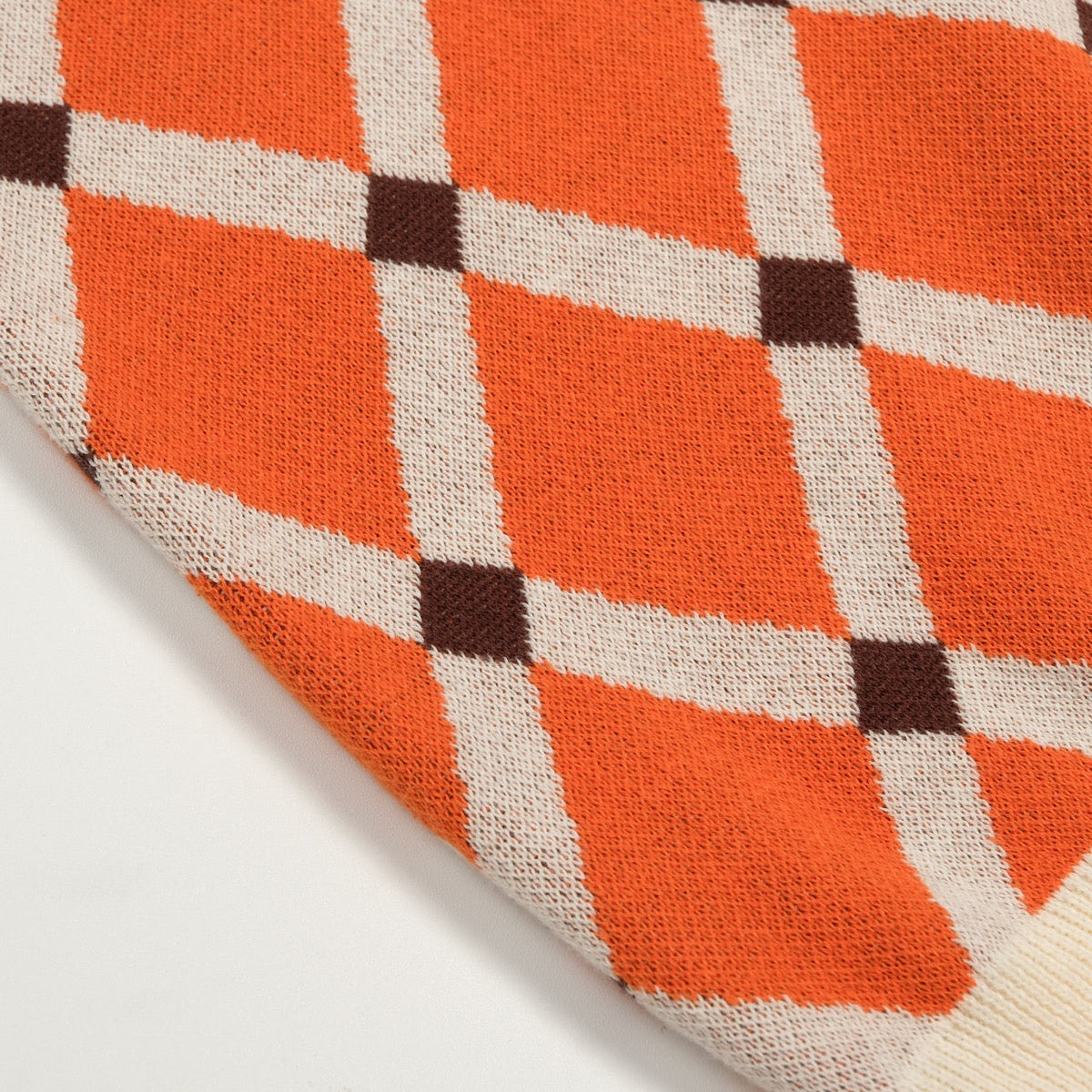 Pull en tricot à losanges orange pour homme, style universitaire des années 70