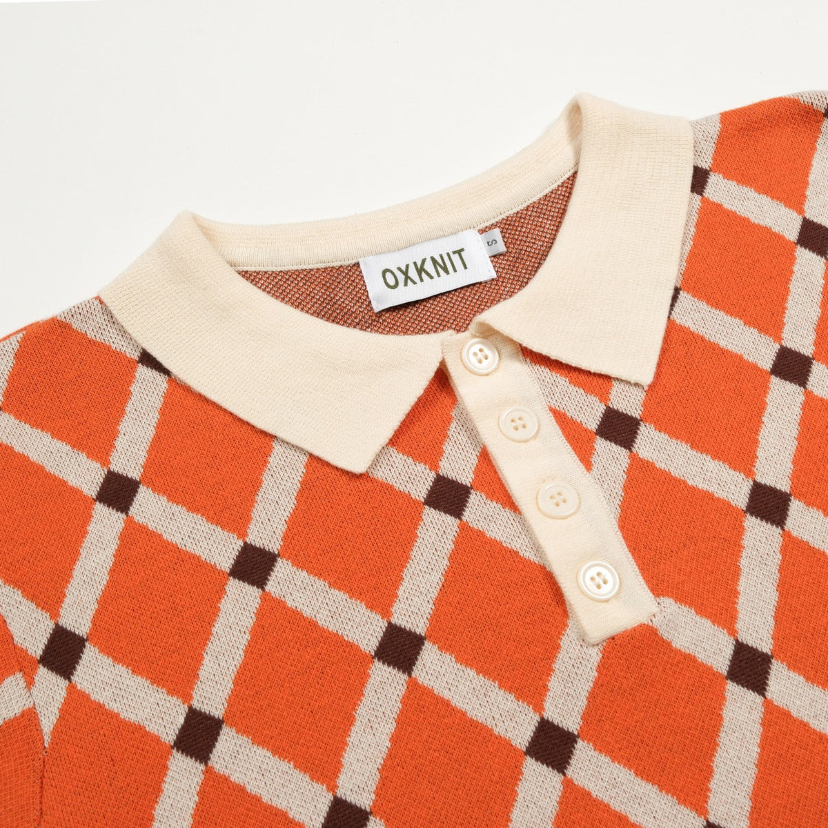 Pull en tricot à losanges orange pour homme, style universitaire des années 70