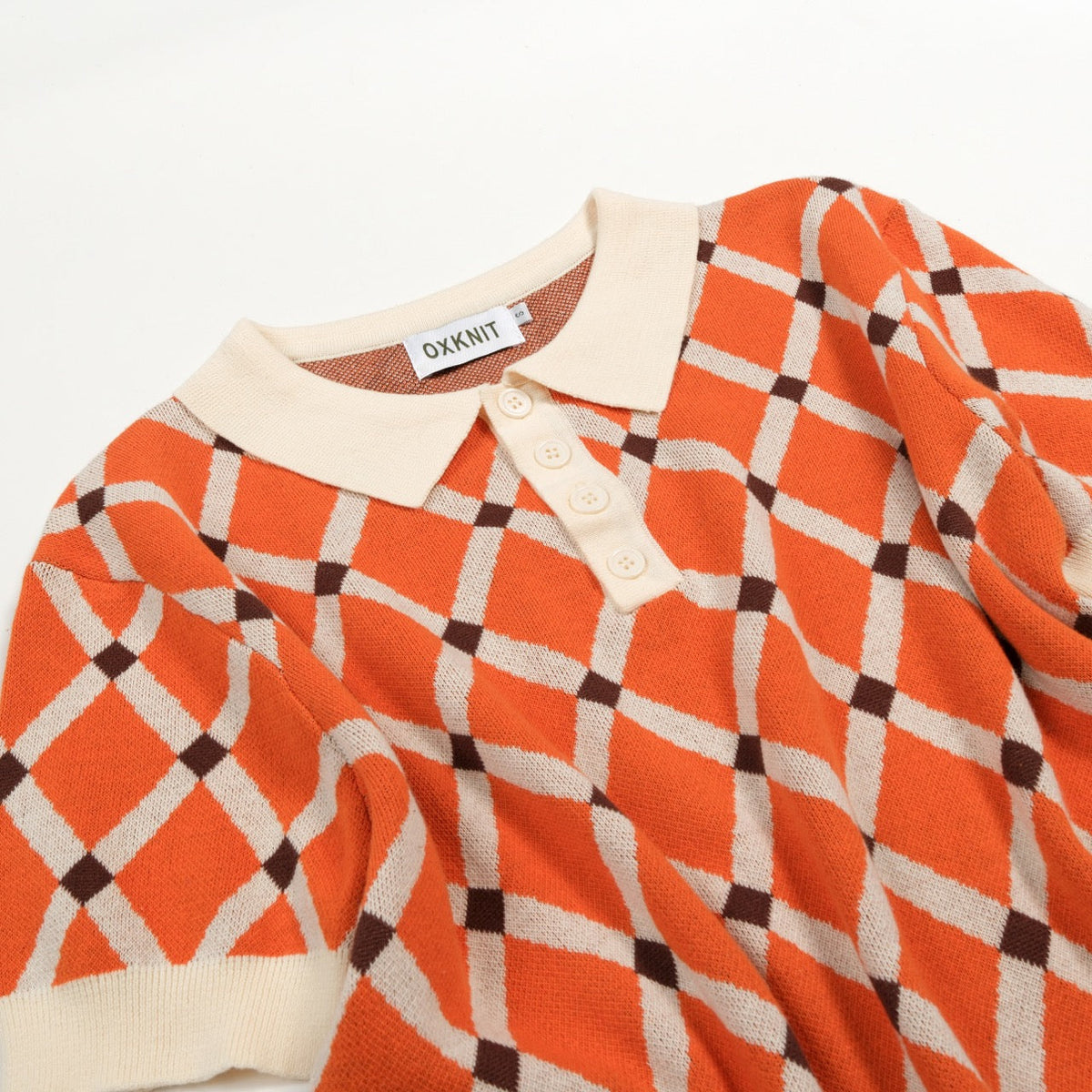 Pull en tricot à losanges orange pour homme, style universitaire des années 70