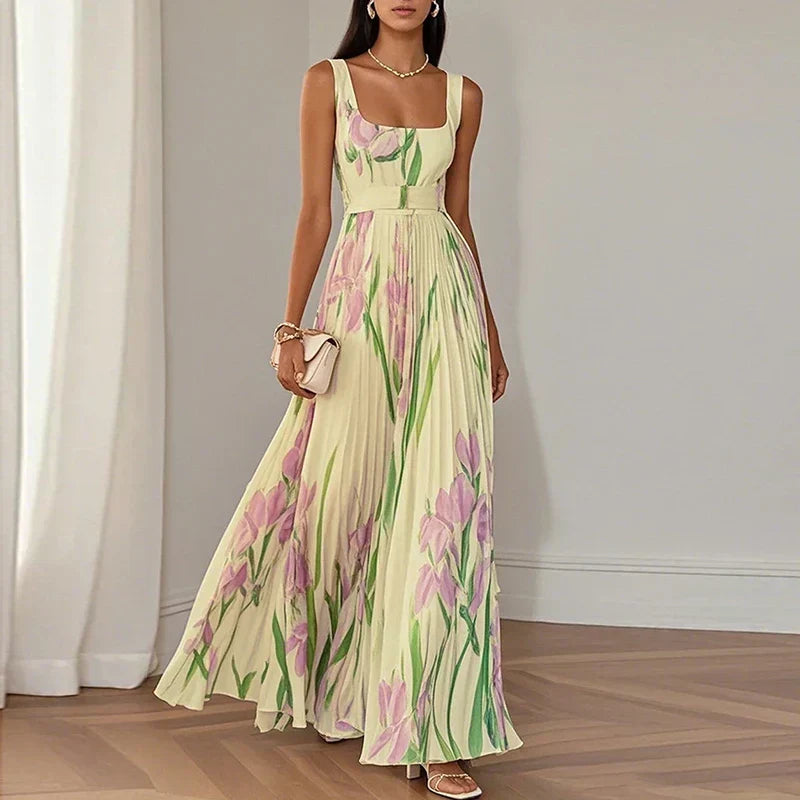 Lyra | Robe longue élégante à motifs floraux, avec une silhouette plissée qui met la silhouette en valeur