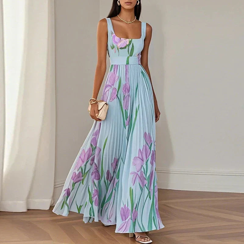 Lyra | Robe longue élégante à motifs floraux, avec une silhouette plissée qui met la silhouette en valeur