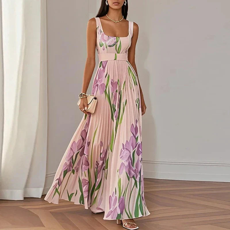 Lyra | Robe longue élégante à motifs floraux, avec une silhouette plissée qui met la silhouette en valeur