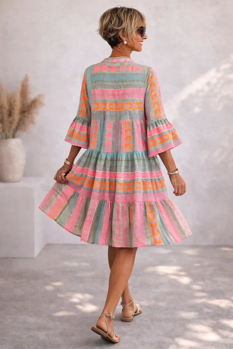 Nova | Une robe midi aux couleurs vives, légère et confortable, idéale pour le week-end