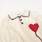 Pull rétro abricot pour homme avec cœur brodé et franges