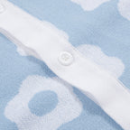 Pull en tricot pour homme des années 60 - Bleu clair avec motif floral rétro blanc