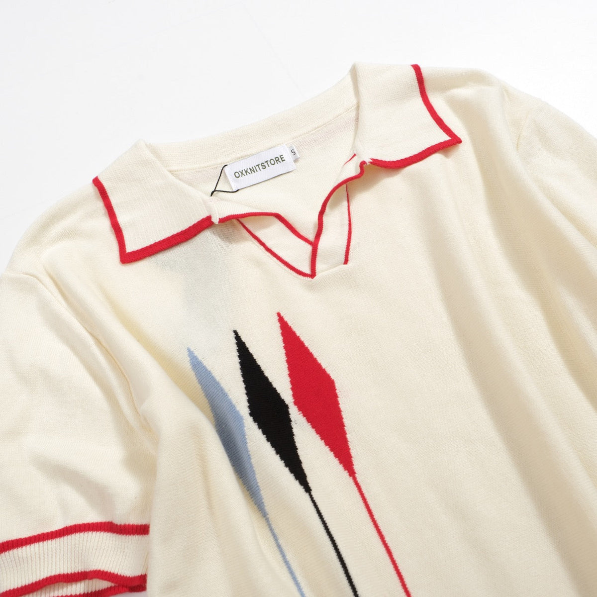 Vintage 1970s Men's Polo – Cream Retro with Red, Black & Blue Arrow Graphic