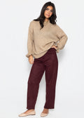 Pantalon à jambes en baril en look daim - bordeaux
