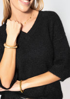 Pull en tricot à manches courtes avec décolleté en V - noir