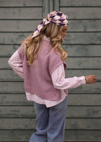 Pull-over en maille côtelée avec boutons sur les côtés - rose poudré