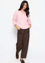 Pull en tricot avec motif en torsades - rose