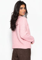 Pull en tricot avec motif en torsades - rose