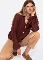 Cardigan en tricot torsadé avec bordure à franges - rouge rouille