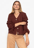 Cardigan en tricot torsadé avec bordure à franges - rouge rouille